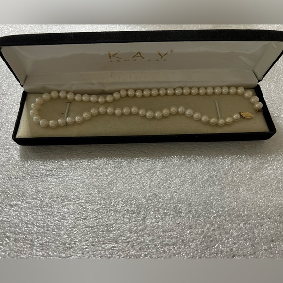 14k gold with natural culture freshwater pearls knotted...